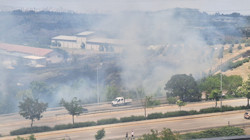 AOÇ Arazisinde Örtü Yangını Çıktı: Alevler Külliye Yakınlarına Ulaştı