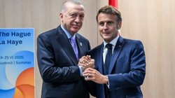 NATO Zirvesi'nde Dikkat Çeken Görüntü! Cumhurbaşkanı Erdoğan-Macron Görüşmesinde Beden Dili Konuştu